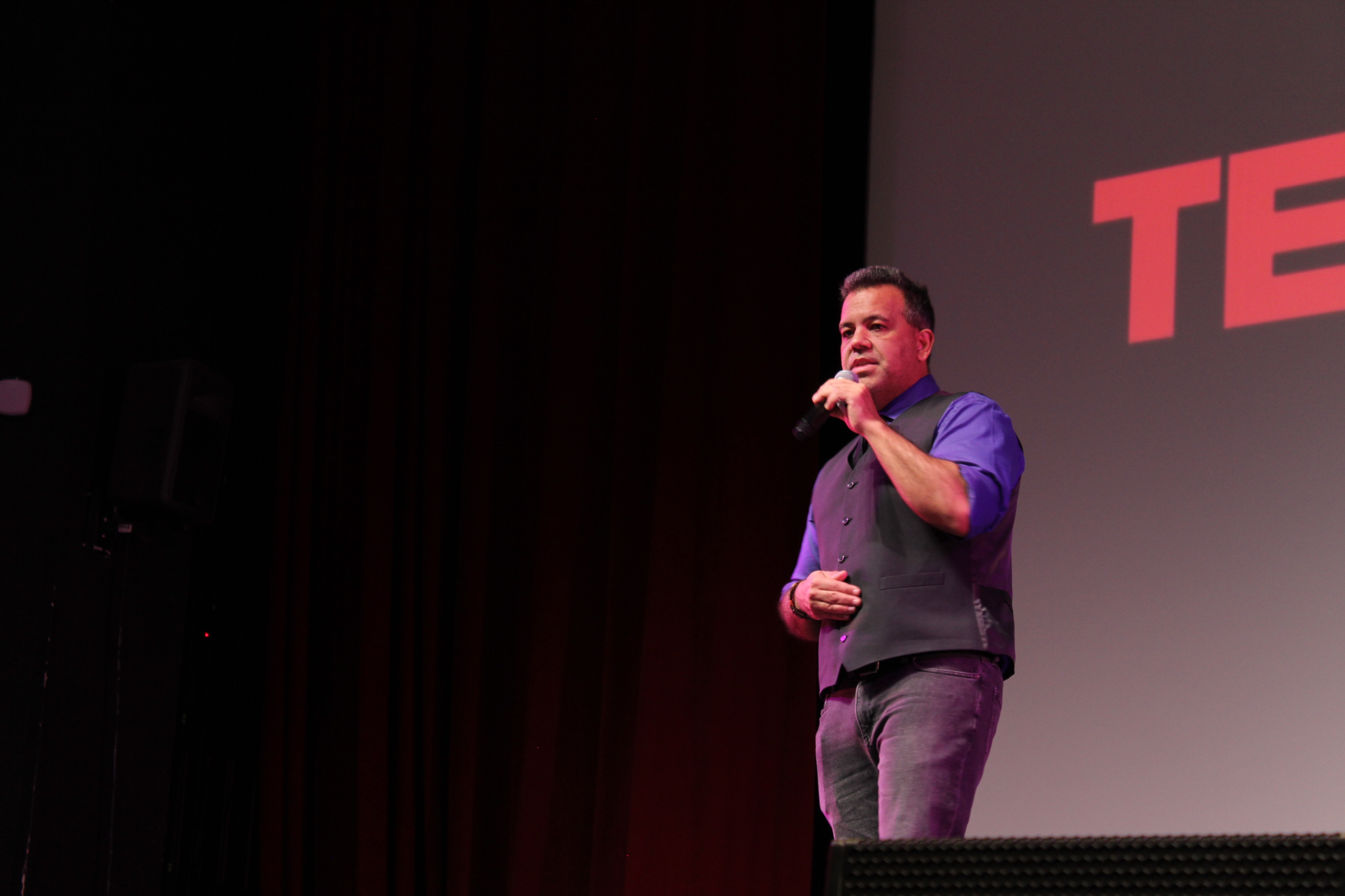 Millian Quinteros on the TEDx LVA stage